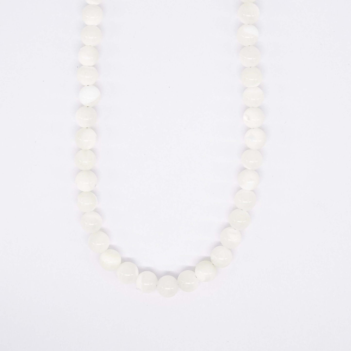 Le collier Duna Belyness Bijoux acier inoxydable tendance femme artisanaux fait main perle d’eau douce collier mode éco-responsable perles de culture douce boucle d'oreilles perle de nacre bracelet en pierres fines bague en pierres naturelles création upcycling recyclés écologique éthique matériaux durable bague minimaliste bohème chic authentique océan mer aventure bijoux surf été skate bellyness belynes bely ness ness bely bellynes beliness bellines belines
