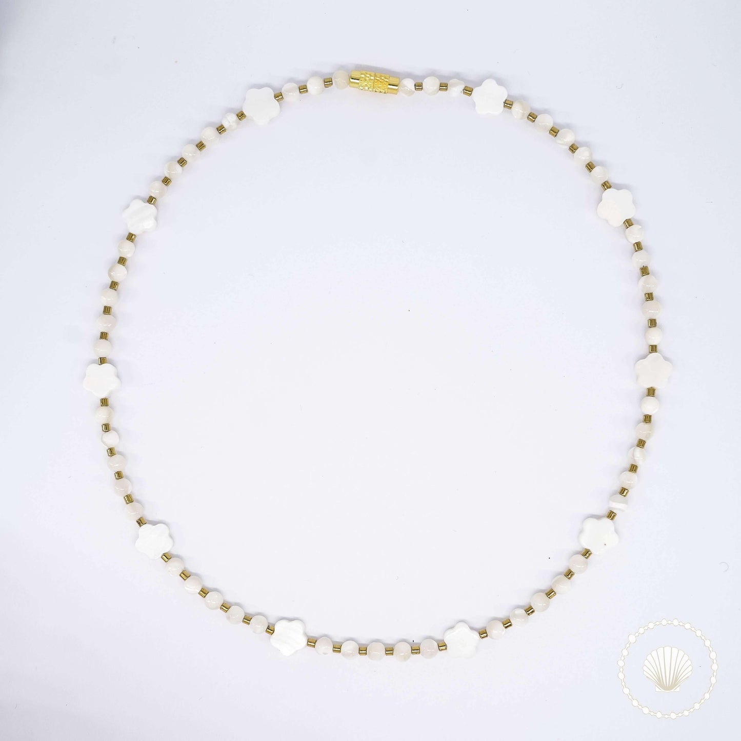 collier ras de cou fleur Phorix Belyness Bijoux bijou unisexe perle naturelle acier inoxydable tendance femme homme enfants personnalisable artisanaux fait main perle de culture d’eau douce de nacre mode éco-responsable en pierres fines création upcycling recyclés écologique éthique matériaux durable bague minimaliste bohème chic authentique océan mer aventure collier bracelet bague surf été skate hiver automne printemps marque française français bellyness belynes bely ness nes belly bellynes bel