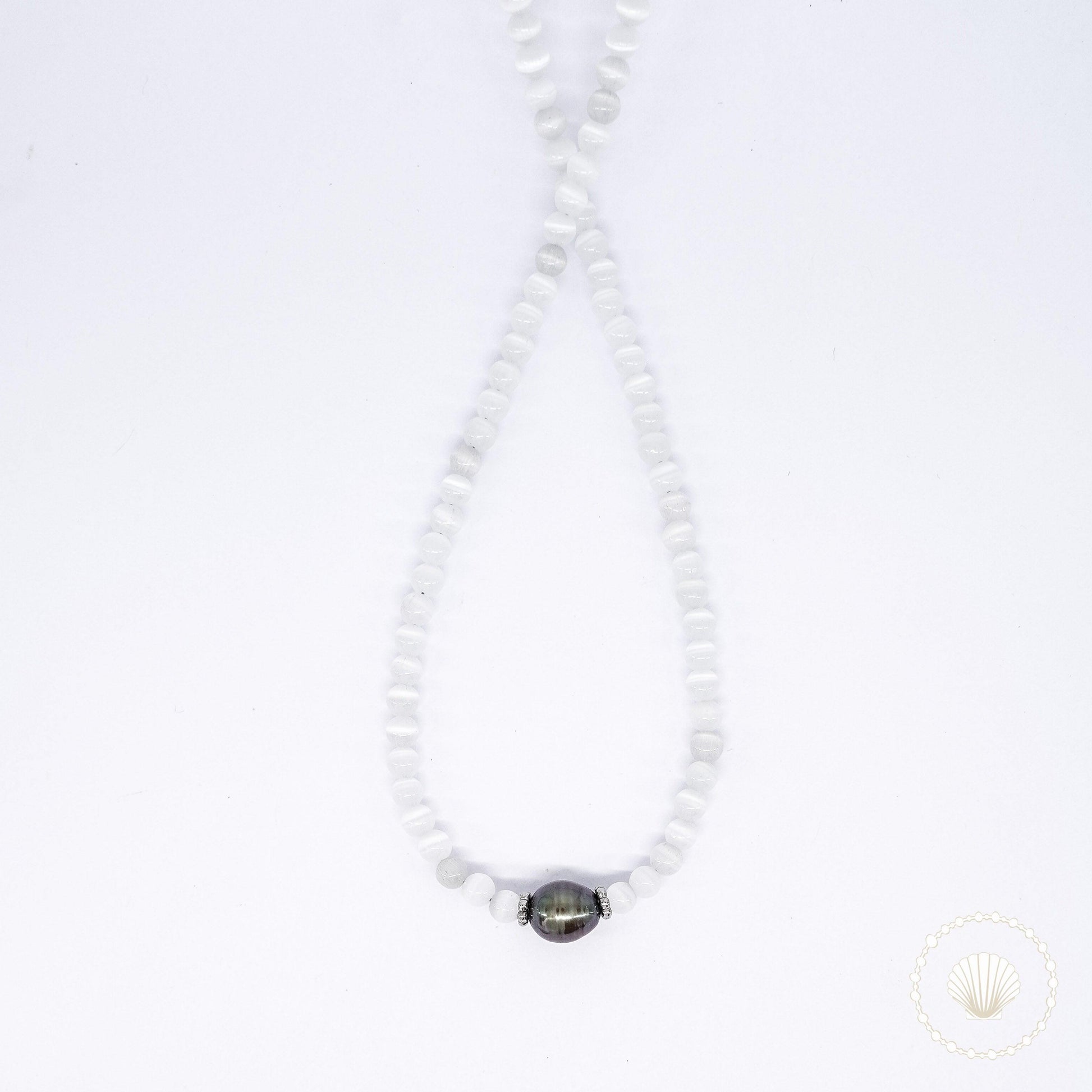 Collier Gonyo Le collier Duna Micro Belyness Bijoux acier inoxydable tendance femme artisanaux fait main perle d’eau douce collier mode éco-responsable perles de culture douce boucle d'oreilles perle de nacre bracelet en pierres fines bague en pierres naturelles création upcycling recyclés écologique éthique matériaux durable bague minimaliste bohème chic authentique océan mer aventure bijoux surf été skate bellyness belynes bely ness ness bely bellynes beliness bellines belines