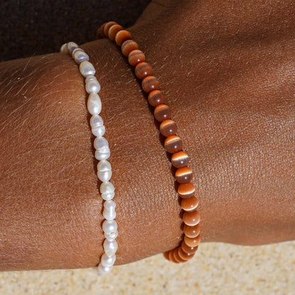 Le bracelet cocco sélénité orange Belyness Bijoux acier inoxydable tendance femme artisanaux fait main perle d’eau douce collier mode éco-responsable perles de culture douce boucle d'oreilles perle de nacre bracelet en pierres fines bague en pierres naturelles création upcycling recyclés écologique éthique matériaux durable bague minimaliste bohème chic authentique océan mer aventure bijoux surf été skate bellyness belynes bely ness nes belly bellynes beliness bellines belines