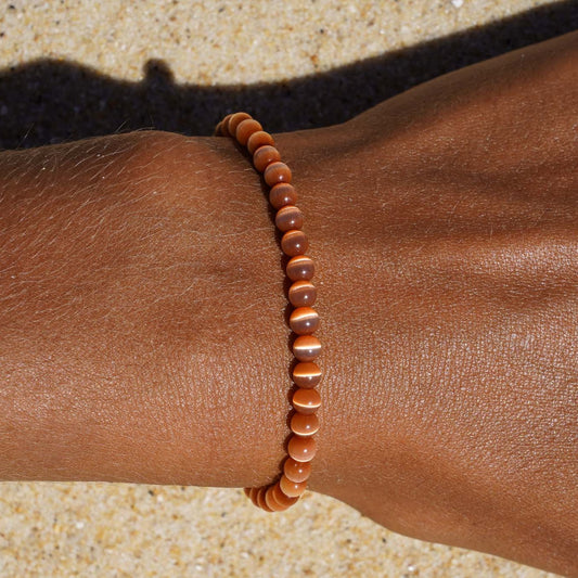 Le bracelet cocco sélénité orange Belyness Bijoux acier inoxydable tendance femme artisanaux fait main perle d’eau douce collier mode éco-responsable perles de culture douce boucle d'oreilles perle de nacre bracelet en pierres fines bague en pierres naturelles création upcycling recyclés écologique éthique matériaux durable bague minimaliste bohème chic authentique océan mer aventure bijoux surf été skate bellyness belynes bely ness nes belly bellynes beliness bellines belines