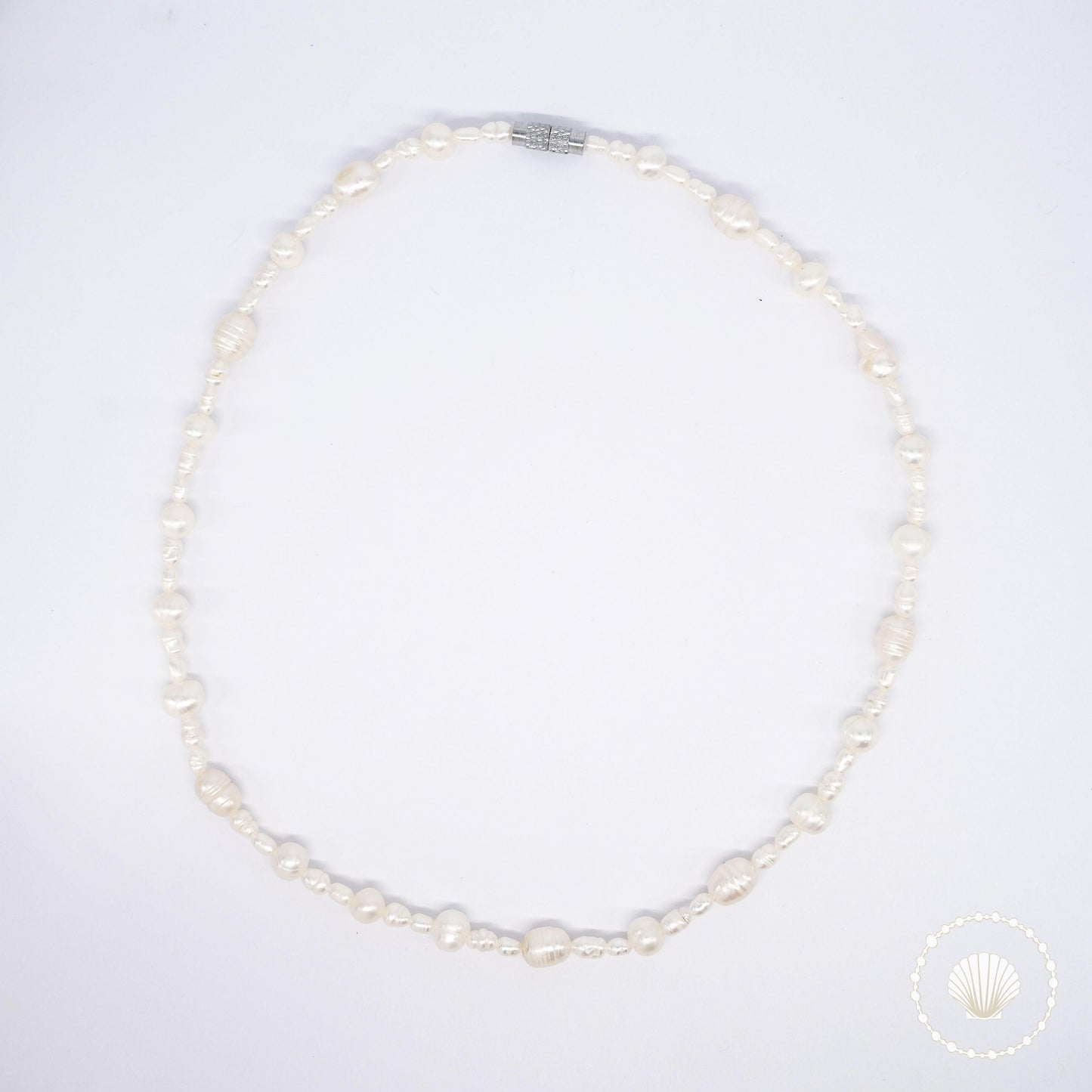 Le collier Diatoma Bijoux acier inoxydable tendance femme artisanaux fait main perle de culture collier mode éco-responsable perles d’eau douce boucle d'oreilles perle de nacre bracelet en pierres fines bague en pierres naturelles création upcycling recyclés écologique éthique bracelet durable bague minimaliste bohème chic authentique océan mer aventure bijoux surf été skate bellyness belynes bely ness ness bely bellynes beliness bellines belines