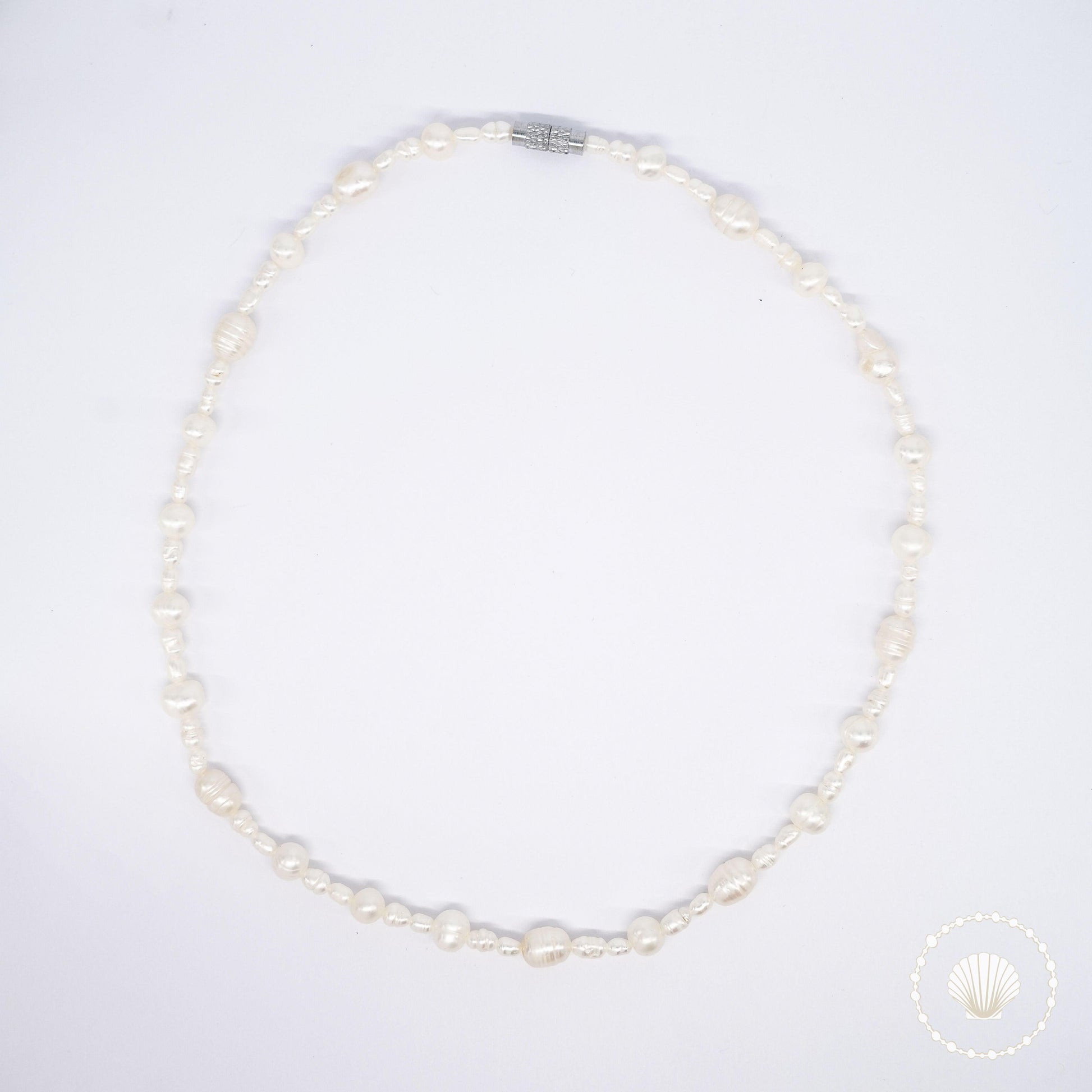 Le collier Diatoma Bijoux acier inoxydable tendance femme artisanaux fait main perle de culture collier mode éco-responsable perles d’eau douce boucle d'oreilles perle de nacre bracelet en pierres fines bague en pierres naturelles création upcycling recyclés écologique éthique bracelet durable bague minimaliste bohème chic authentique océan mer aventure bijoux surf été skate bellyness belynes bely ness ness bely bellynes beliness bellines belines