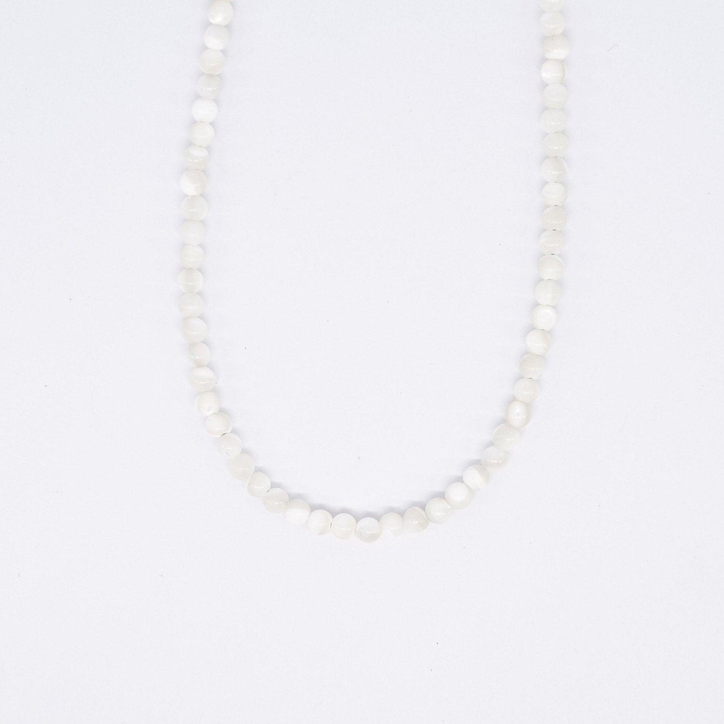 Le collier Duna Micro Belyness Bijoux acier inoxydable tendance femme artisanaux fait main perle de culture collier mode éco-responsable perles d’eau douce boucle d'oreilles perle de nacre bracelet en pierres fines bague en pierres naturelles création upcycling recyclés écologique éthique bracelet durable bague minimaliste bohème chic authentique océan mer aventure surf skate