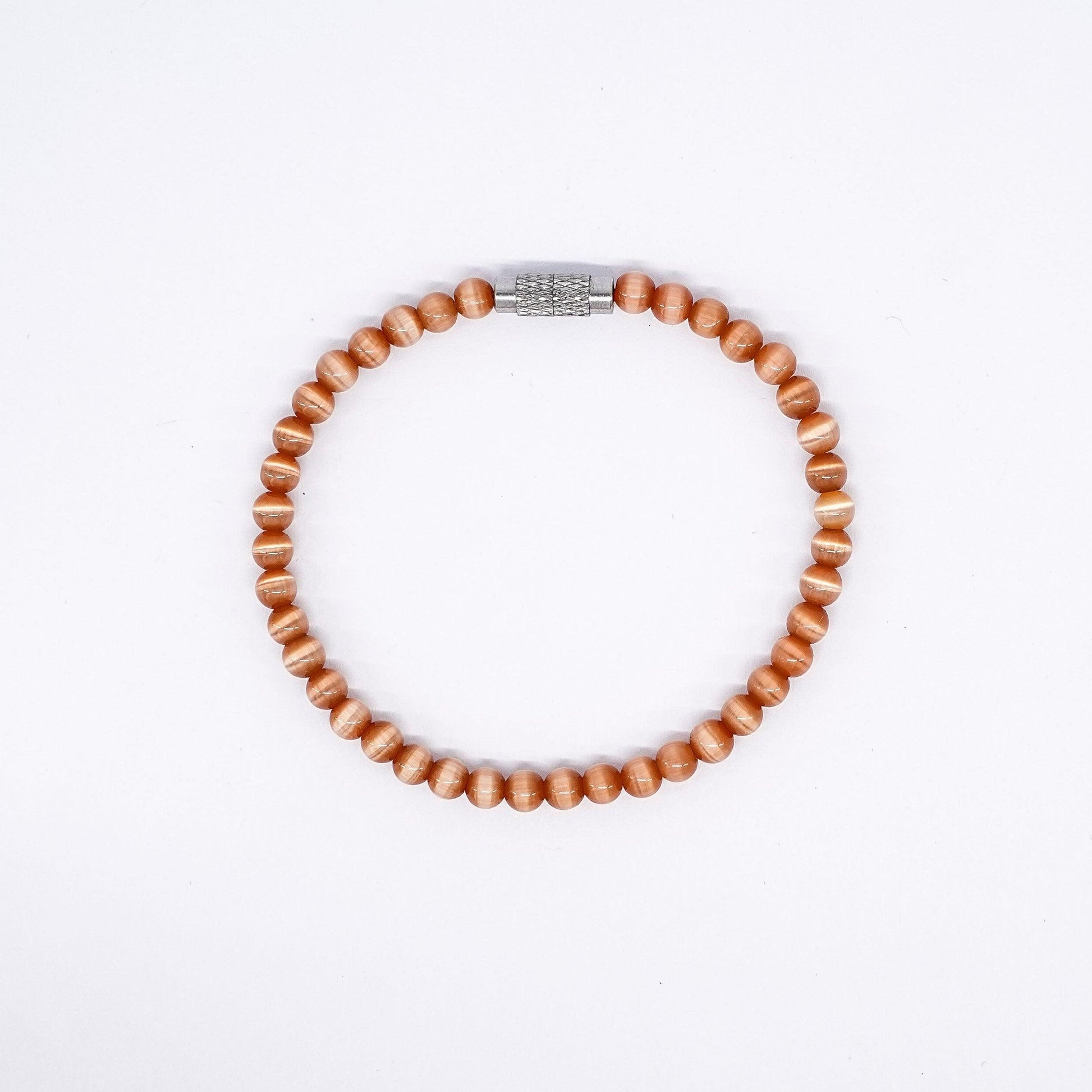 Le bracelet cocco sélénité orange Belyness Bijoux acier inoxydable tendance femme artisanaux fait main perle d’eau douce collier mode éco-responsable perles de culture douce boucle d'oreilles perle de nacre bracelet en pierres fines bague en pierres naturelles création upcycling recyclés écologique éthique matériaux durable bague minimaliste bohème chic authentique océan mer aventure bijoux surf été skate bellyness belynes bely ness nes belly bellynes beliness bellines belines