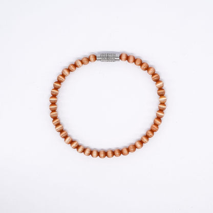 Le bracelet cocco sélénité orange Belyness Bijoux acier inoxydable tendance femme artisanaux fait main perle d’eau douce collier mode éco-responsable perles de culture douce boucle d'oreilles perle de nacre bracelet en pierres fines bague en pierres naturelles création upcycling recyclés écologique éthique matériaux durable bague minimaliste bohème chic authentique océan mer aventure bijoux surf été skate bellyness belynes bely ness nes belly bellynes beliness bellines belines